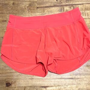 Lululemon 6 tall workout shorts with attached panty. Back zipper